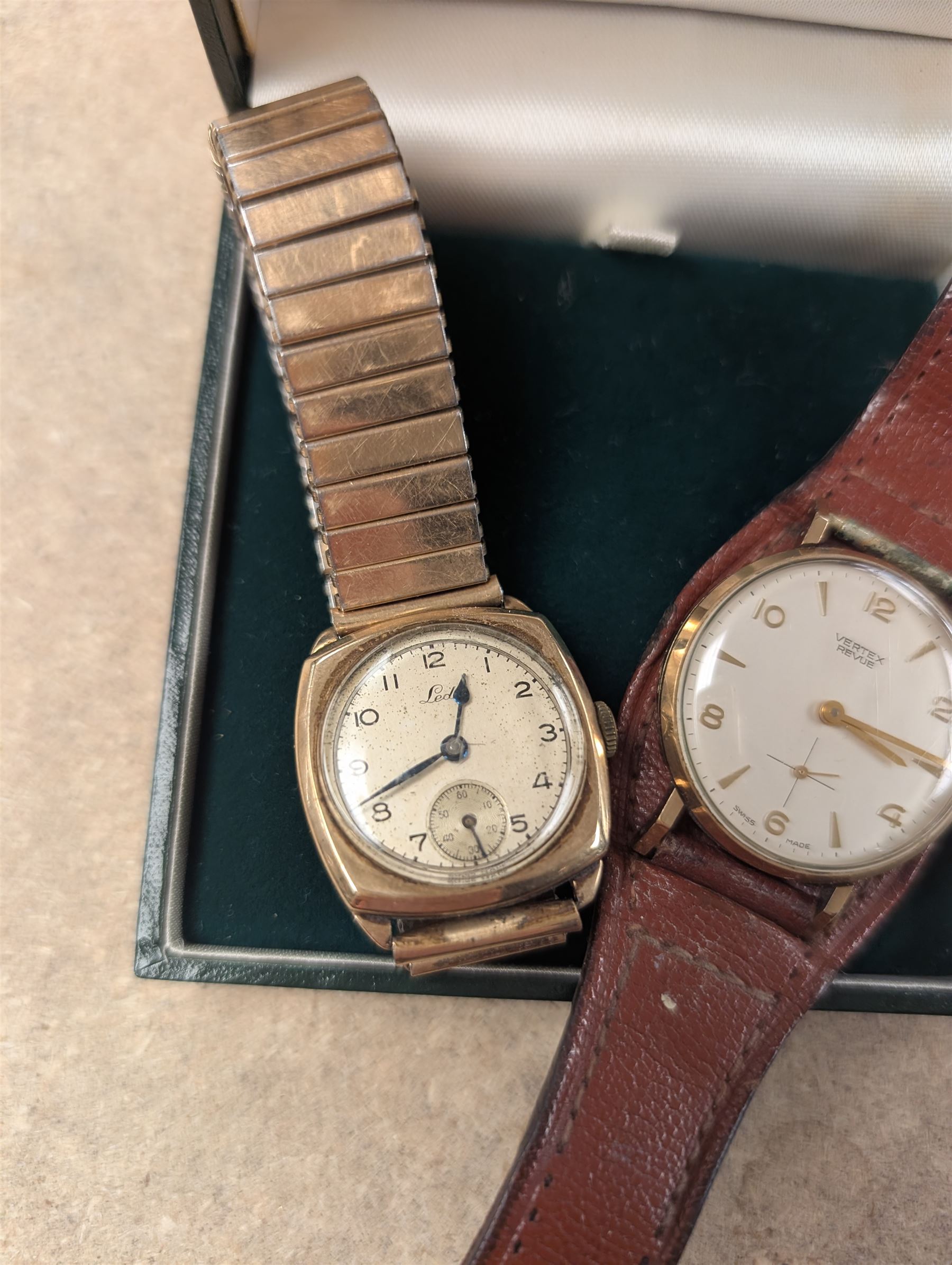 Two 9ct gold cased wristwatches, to include Vertex Revue presentation wristwatch on leather strap and Leda wristwatch on base metal strap