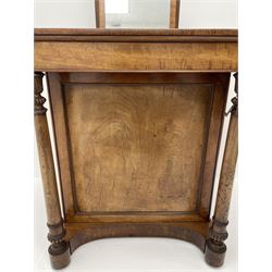 Early Victorian figured mahogany dressing cabinet, the raised shell and scroll carved back lifts to reveal rectangular easel mirror with mahogany band, flat rectangular top with tooled leather inset, slide at each side with matching leather inset, full width drawer above cupboard enclosing a series of five drawers, turned front supports, panelled front, sides and back