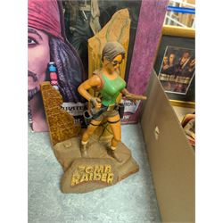 Collection of Disney and similar figures and memorabilia, including Pirates of the Caribbean Capt Jack Sparrow talking figure and NECA toys Jack Sparrow Head Knocker, three Disney showcase figures, Kermit the Frog framed film cell and Tomb Raider figure