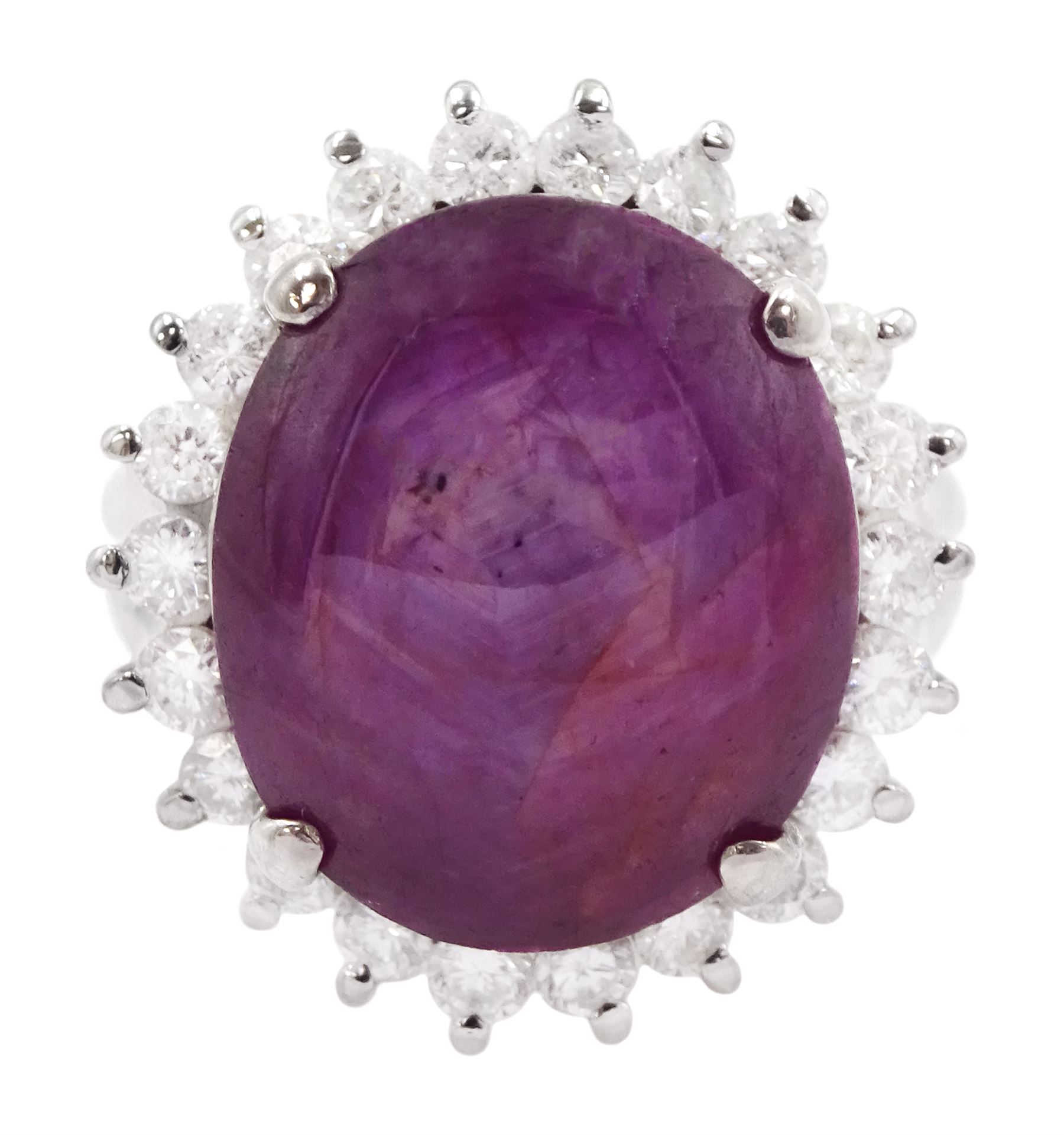 Platinum cabochon star ruby and round brilliant cut diamond cluster ring, stamped Pt900, ruby 12.57 carat, total diamond weight 0.88 carat