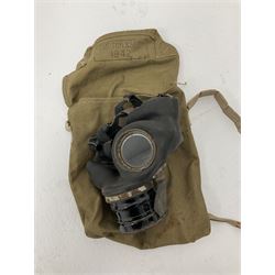 RAF Flight Lieutenant's uniform with peaked cap and WW2 ribbon bar; WW2 gas mask in blue canvas bag dated 1942; flying helmet date 1984; and British Army Major's uniform with Staybrite buttons and peaked cap