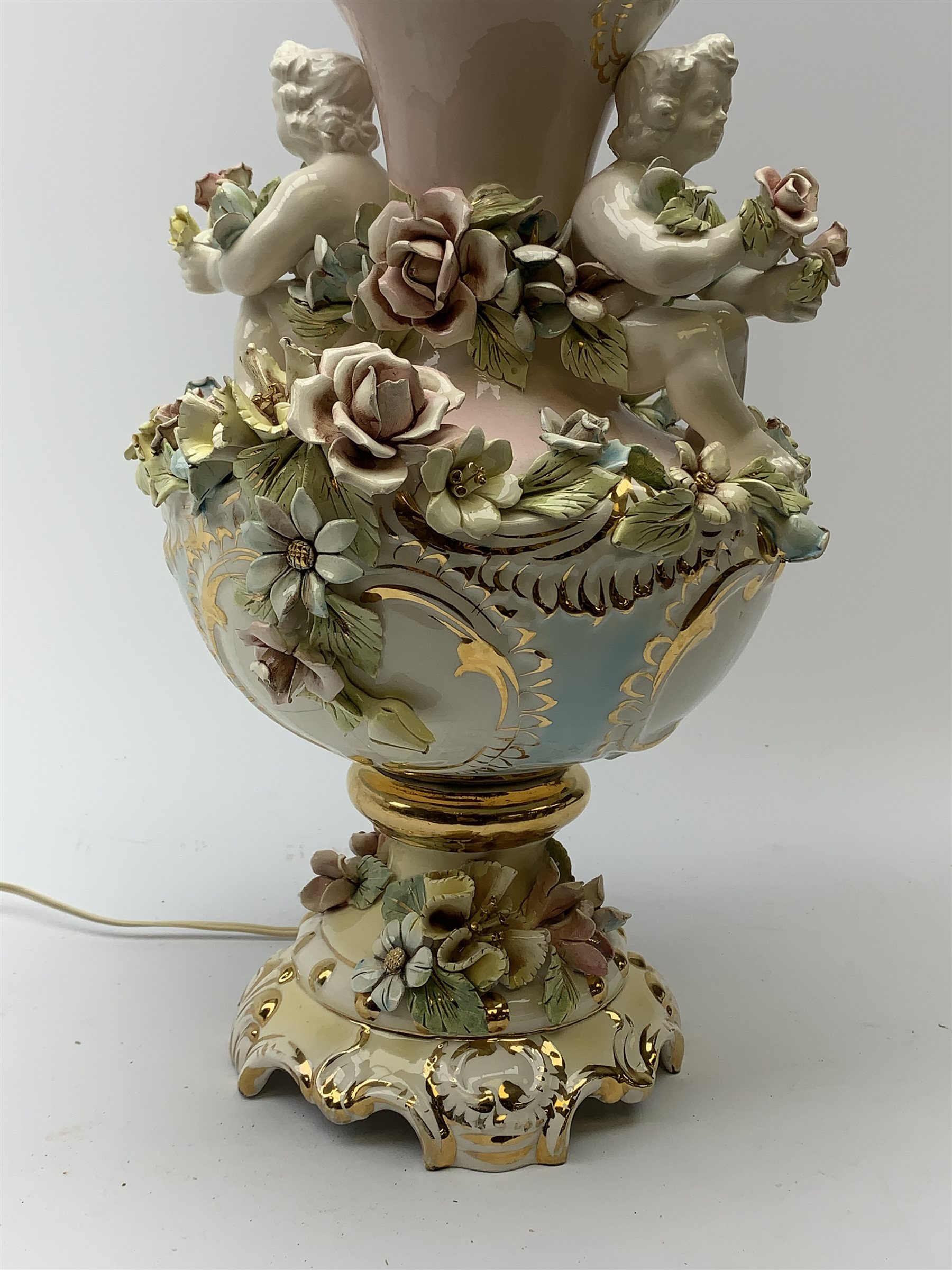 A Italian Capodimonte style lamp base, of pedestal urn form with