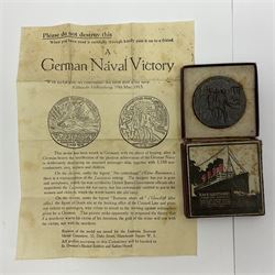 RMS Lusitania iron medallion dated 5th May, 5.5cm diameter, boxed with St Dunstan's Blinded Soldiers Profit paperwork; another unboxed similar Lusitania medallion; 30th Corps Alamein Cuxhaven medallion; Battle of Jutland 1916 silver memorial pendant; Navajo Code Talkers medallion 2000; and five other military related medallions