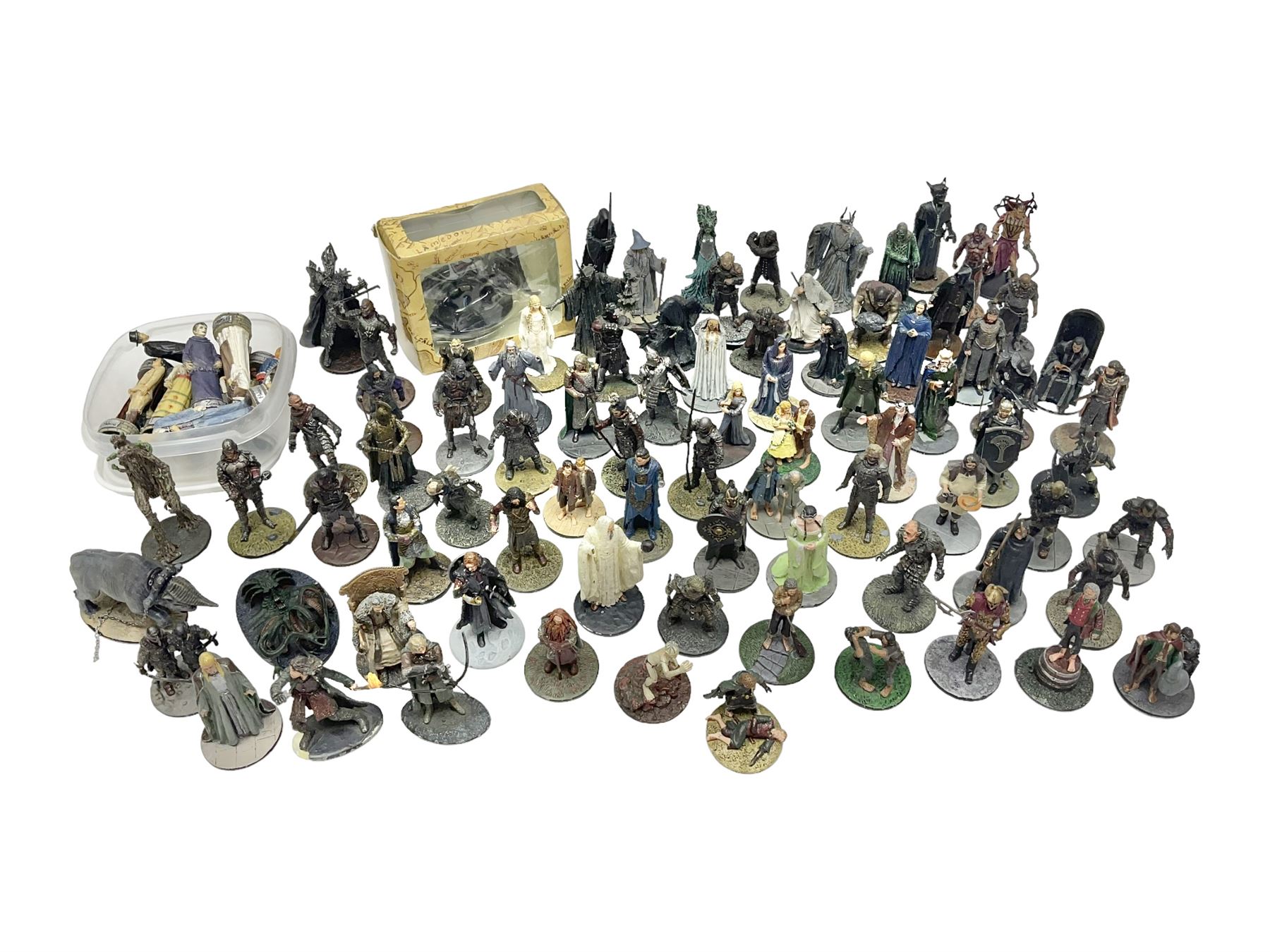 Approximately 80 NLP Lord of the Rings heavy metal painted figurines to include Fell Beast, boxed, and The Watcher, The Dark Lord Sauron, Treebeard etc, and unassociated Dracula themed composite figures marked HHFT50 