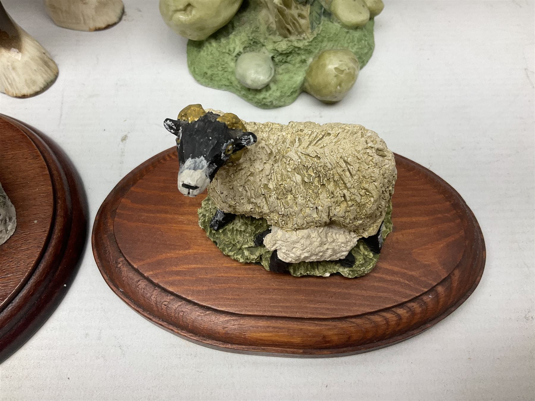 Two Border Fine Arts figures, comprising Badgers and Blackbird, together with Beswick bay shire horse no 818 and another figure