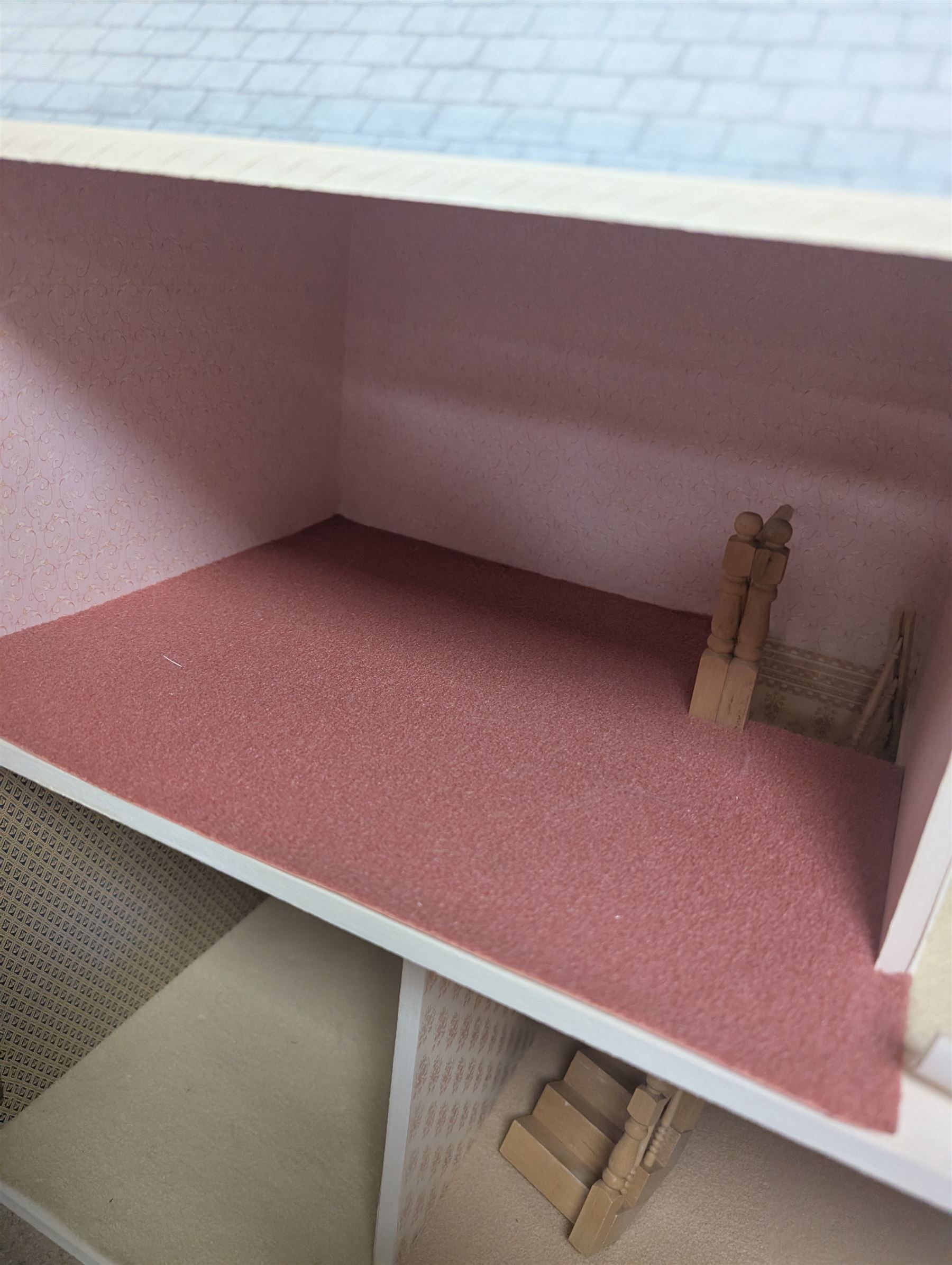 Two storey modern dolls house, with a collection of dolls house furniture and accessories, dolls house H66cm