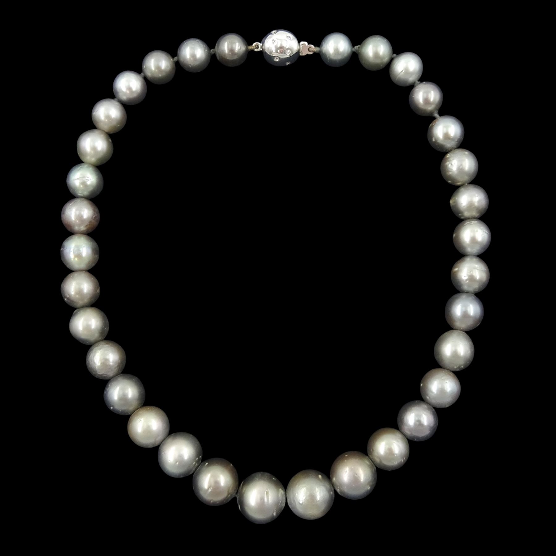 Single strand graduating Tahitian pearl necklace, with 18ct white gold, rubover set, round brilliant cut diamond clasp, hallmarked