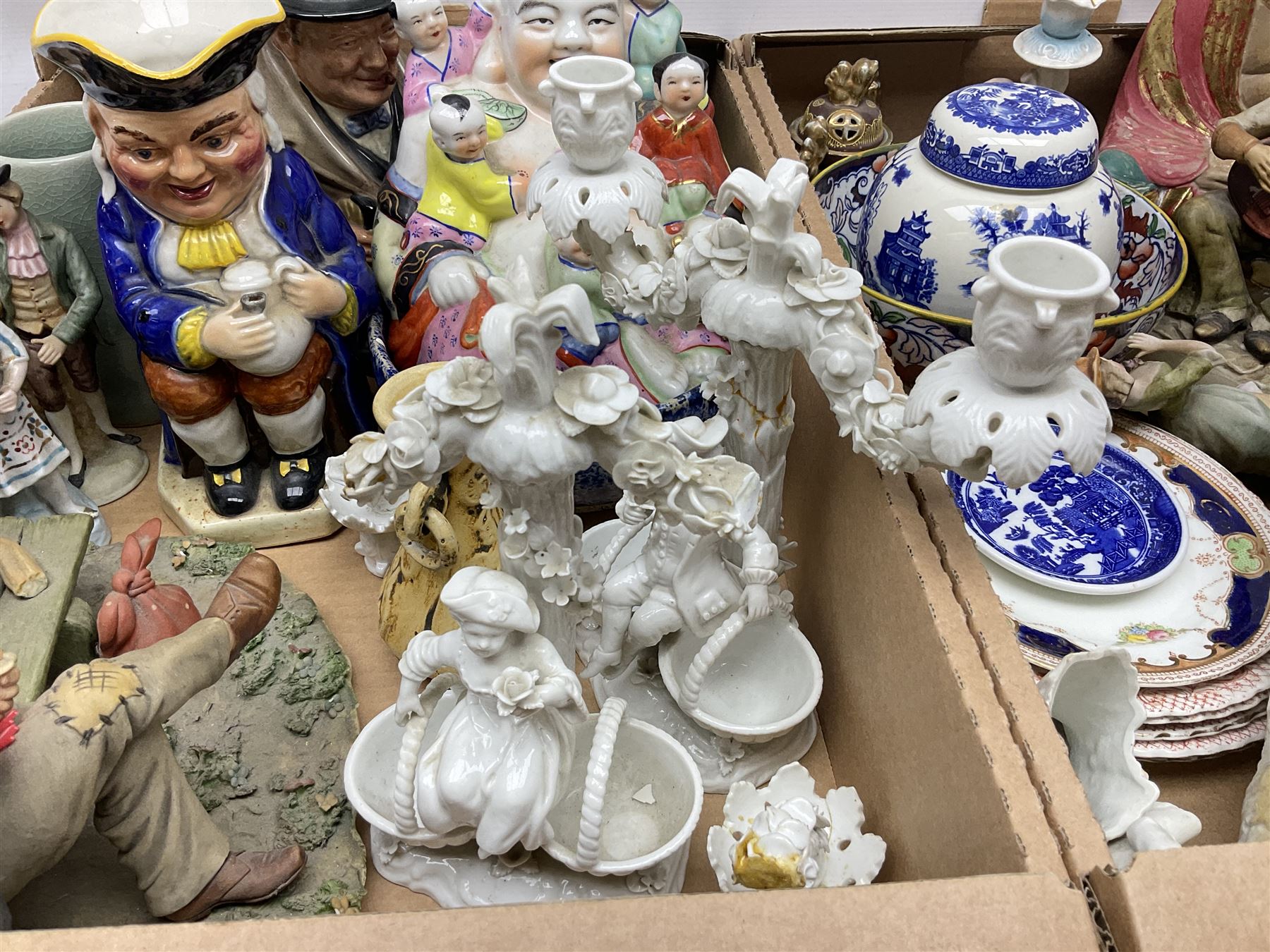 Collection of ceramics to include Royal Doulton Winston Churchill toby jug, Capodimonte style figures, novelty brandy decanter etc, in two boxes