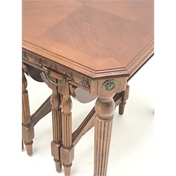  Two walnut nest of tables, each table with two smaller nesting tables with foldout bases, on turned and reeded supports, 56cm x 56cm, H52cm  