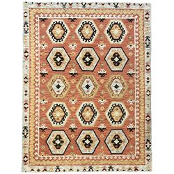  OKA - Turkish design peach ground rug, the field decorated ejder motifs within hooked and geometric design borders 