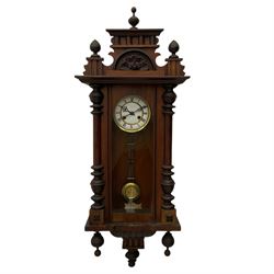 A late 19th century German wall clock wi