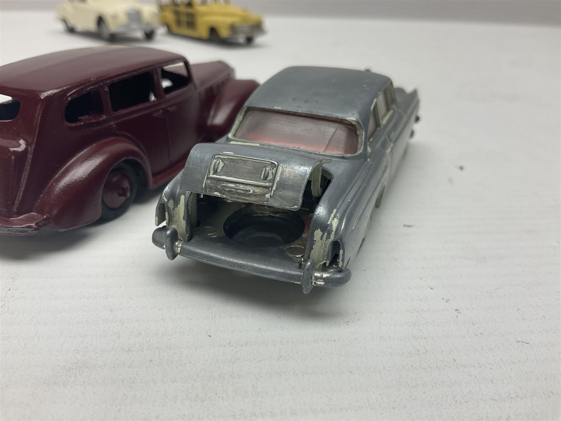 Eleven unboxed and playworn early die-cast models including Dinky Packard, Buick, two Jaguar Mark X and estate wagon, Corgi Mercedes-Benz 300S.L. Roadster, Ford Thunderbird, Citroen DS19 and Bentley Continental Sports Saloon, Spot-On Armstrong Siddeley Sapphire etc; all unboxed (11)