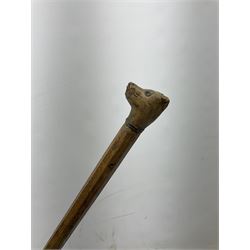 Walking cane with carved treen handle modelled as a dogs head, with pin eyes and pinned collar, L81cm

