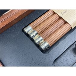 Graf Von Faber-Castell Pencil Cassette, housed in alder wood presentation box with mirrored hinged lid, containing platinum plated Perfect Pencil, sharpener, four erasers and four replacement pocket pencils with native alder handles hand-selected by Nuremberg woodcarvers, with certificate, cloth and original green box