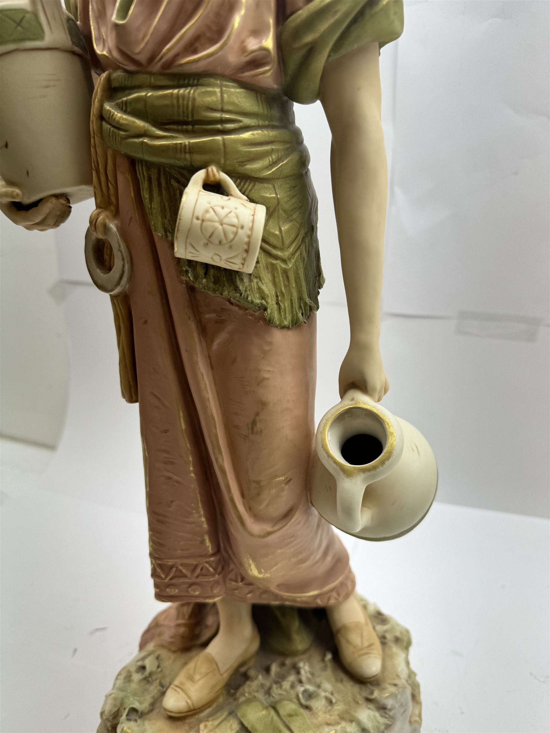 Royal Dux figure no. 686, modelled as a female water carrier, carrying two urns and wearing flowing green and pink robes, with applied pink triangle mark beneath, H61cm