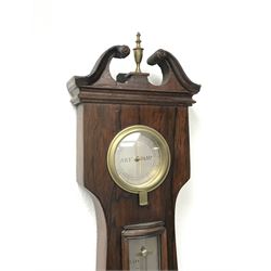 Early 19th century rosewood four dial banjo barometer, dry/damp dial, mercury thermometer, silvered circular register engraved with urn and scroll decoration, balance signed 'Vassalli Scarborough', fitted with mother of pearl adjusting handle
