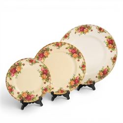Royal Albert Old Country roses part tea and dinner service, including teapot, milk jug, open sucrier, cake stand, six dinner plates, etc