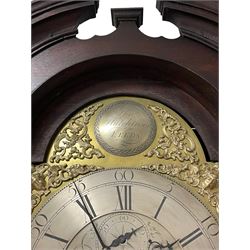 Thomas Hutchinson of Leeds - 18th century 8-day oak longcase clock with as broken arched  pediment and moulded cornice, with a conforming hood door flanked by plain turned pilasters with gesso capitals,  long trunk door with a wavy top on a square plinth with a raised panel, brass dial with cast spandrels,  engraved silvered dial centre and chapter ring with Roman numerals, five minute Arabic's and minute track, with pierced steel hands, seconds pointer,  arched calendar aperture and silvered boss engraved with the makers name to the break arch, dial pinned to a rack striking two train movement with a recoil anchor escapement. With weights and pendulum. Thomas Hutchinson is recorded as working in Leeds from 1760-90.