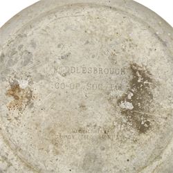 20th century aluminium set of three milk churns, with handles, baring the stamps of 'Middlesborough Co-op', 'Holme Moor', 'Wholesale Dairies' 