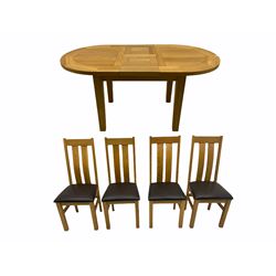 Solid oak oval extending dining table, butterfly leaf extension, four chairs with brown upholstered seats