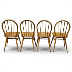 Ercol - set of four elm 'Windsor' chairs, hoop design back dish seat, tapering supports united by H-stretcher 