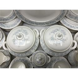 Royal Doulton tea and dinner wares in the Meadow Mist pattern, no H5007, comprising seven dinner plates, eight side plates, two lidded tureens, two jugs, lidded sucrier, oval serving dish, six teacups, seven saucers, seven tea plates and large saucer