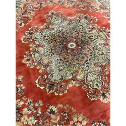 Persian design 'Super Kashan' peach ground carpet, floral design large rosette medallion and spandrels, scrolling border decorated with flower heads