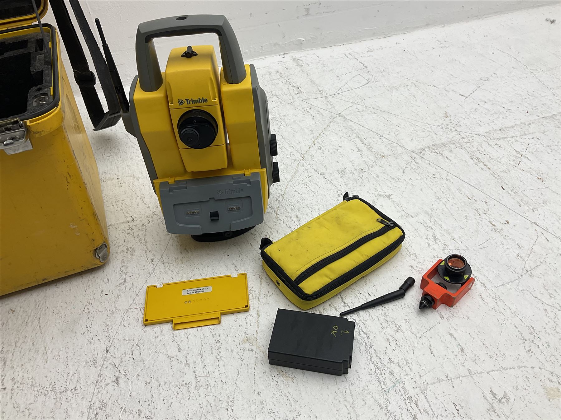Trimble land surveying equipment - 5000 Series 5603 DR300+ Robotic Reflectorless Total Station, serial no.84310406; in carrying case; together with GPS Holder 58317019, serial no.95320184; ACU 571225500, serial no.83214786; Docking Station 58252019, serial no.95823458 with Power Supply; RMT 606 Remote Target on pole with CU Holder and External Georadio 2.4GHz; cased Power Pack Kit; folding tripod; and aluminium 5m telescopic measuring staff