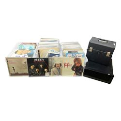 Large quantity of vinyl LPs, predominantly rock and pop, to include Elvis, Elton John, The Kinks, Deep Purple, Eurythmics, Whitney Houston, Phil Collins, Rolling Stones etc, in three boxes, together with quantity of 45 rpm records, Steepletone SRP1R-11 record player and record carry case