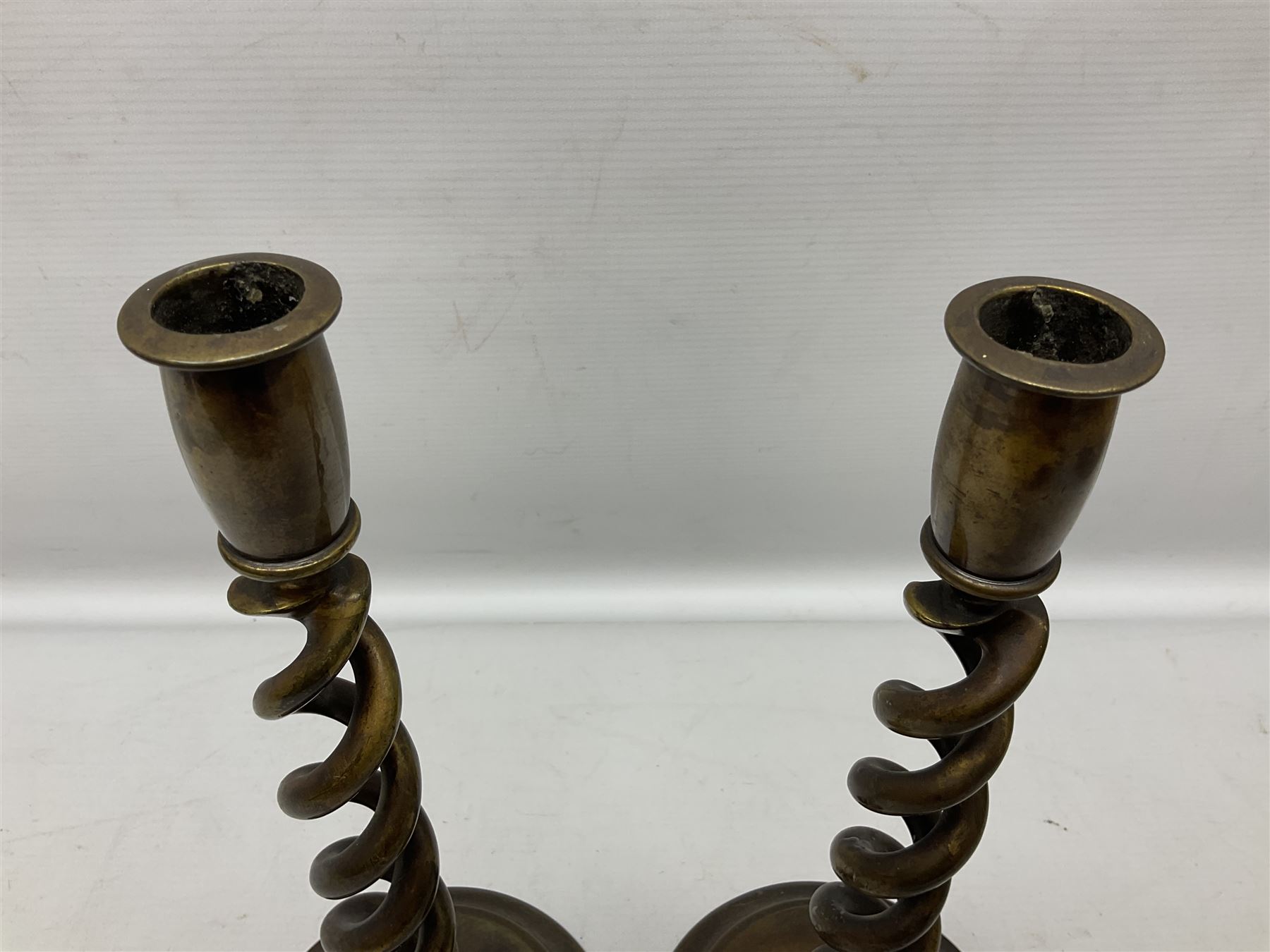 Pair of Victorian brass barley twist candle sticks, H30cm