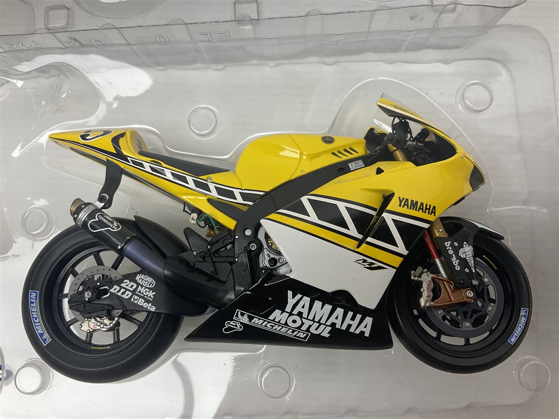 Three Minichamps 1:12 scale die-cast motorcycles - Yamaha YZR 500 Max Biaggi 2000; Yamaha YZR-M1 Colin Edwards Fiat Yamaha Team MotoGP 2007 GP Australia; and Yamaha YZR 500Team Yamaha Max Biaggi 500ccGP 2001; all boxed (3)