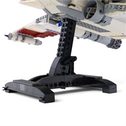 Three Lepin Star Wnrs built models, comprising Red Five X-Wing Starfighter no. 05039, Millennium Falcon no. 05132 and Super Star Destroyer no. 05028