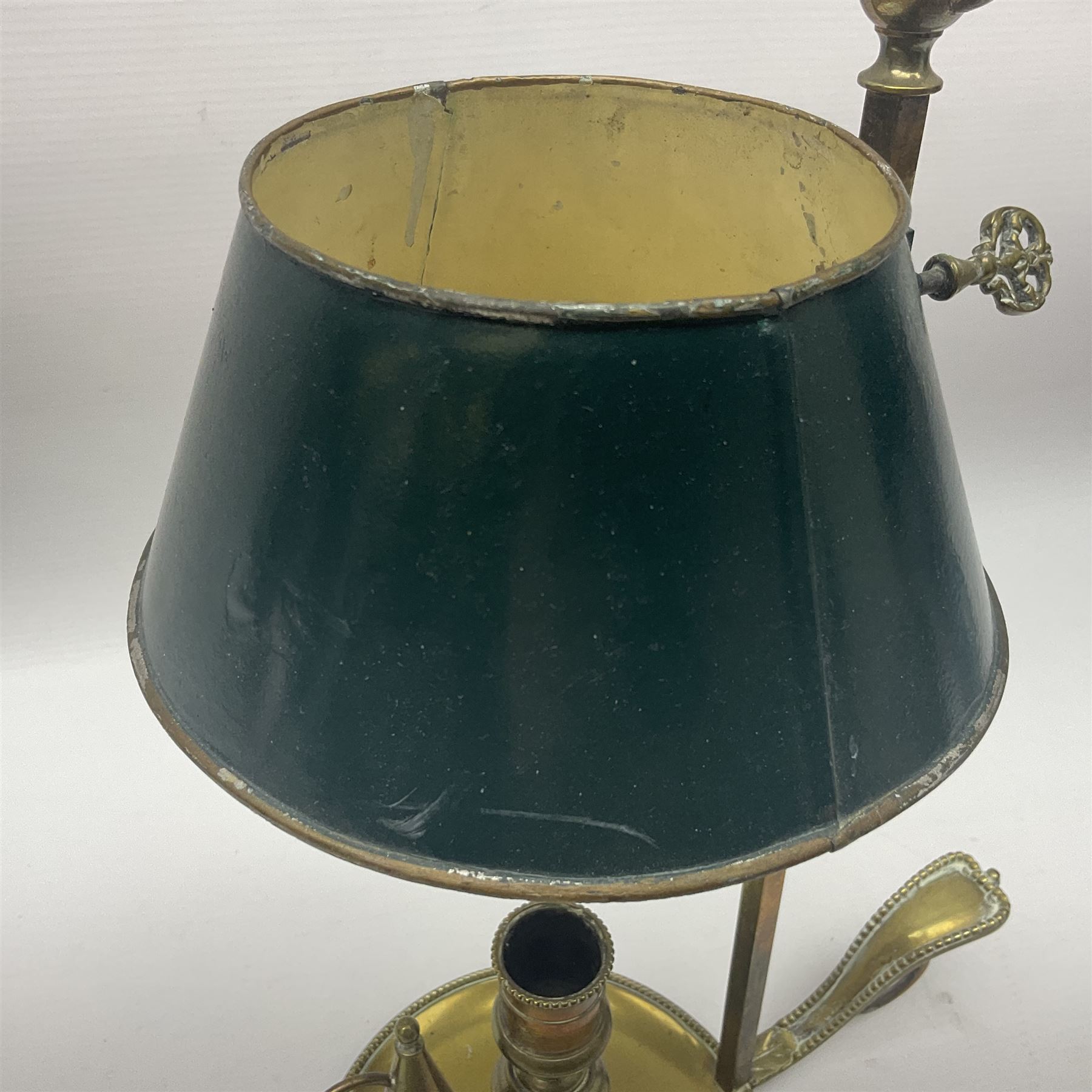 19th century brass Bouillotte candle lamp with adjustable green tole painted shade, with a circular base and snuffer, H36cm
