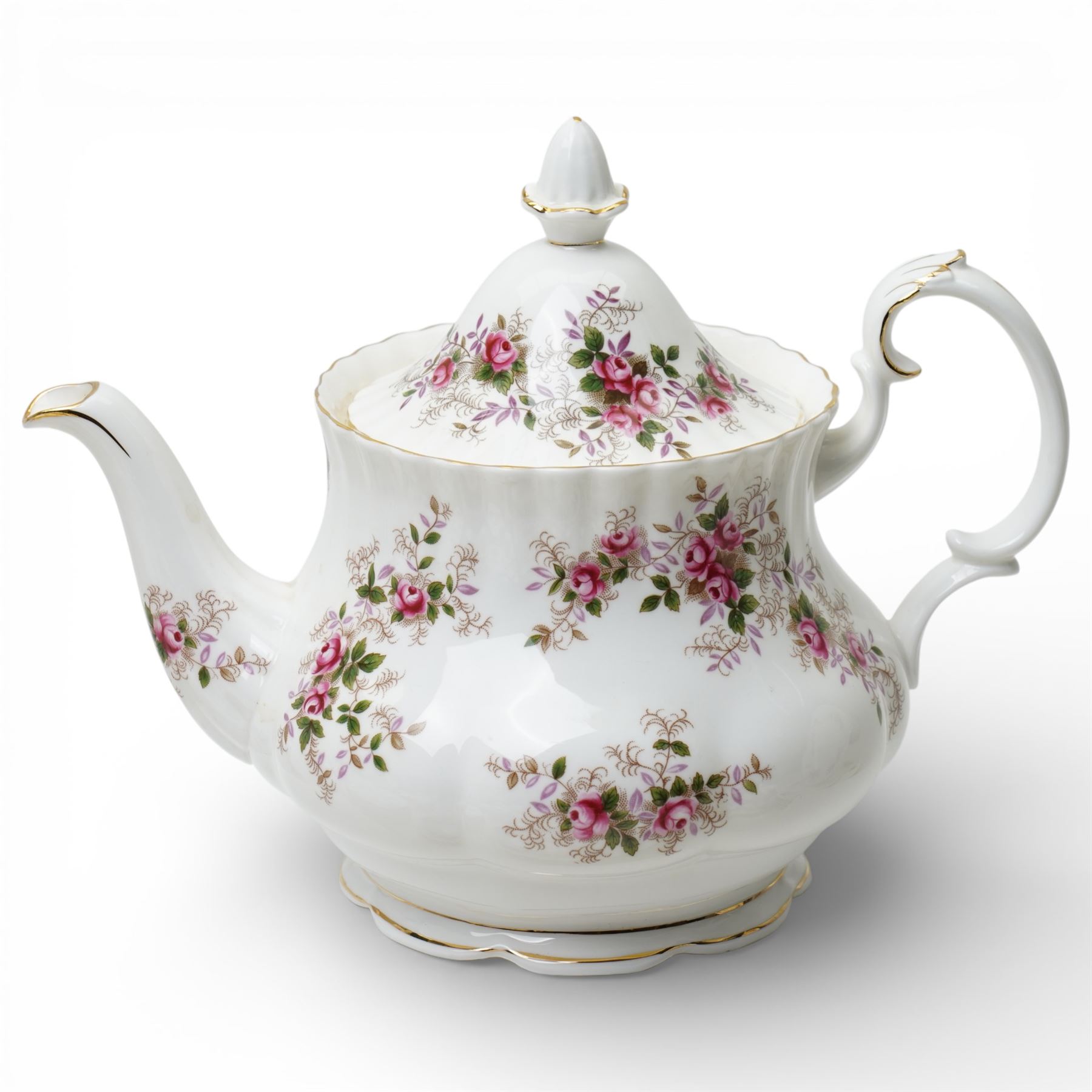 Royal Albert Lavender Rose tea and dinner wares, comprising eight dinner plates, and eight small dinner plates, eight side plates, open serving dish, teapot, open sucrier, salt and pepper, sandwich plate, sauce boat and saucer, eight teacups and saucers, six bowls, six oval serving dishes, and one platter