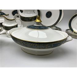 Royal Doulton Carlyle pattern tea and dinner service for six, to include teapot, coffee pot, teacups and saucers, coffee cups and saucers, milk jug, open sucrier, dinner plates, side plates, bowls, soup bowls, to covered dishes etc (64) 