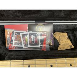 Ernie Ball Music Man Sting Ray 4 string bass guitar, in natural finish with roasted maple neck and tortoiseshell effect scratch guard, serial no 87485, in black Music Man hard case, guitar L114cm