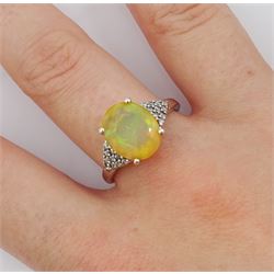 9ct white gold opal and cubic zirconia cluster ring, hallmarked 
