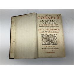 Three 17th century Lugduni (Lyon) printed books each with engraved title page in red and black comprising R.P. Corn Cornelii A Lapide .... Tomus Primus. 1690; R.P. Cornelii Cornelii A Lapide .... 1683; and Hortus Pastorum Sacrae Doctrinae Floribus Polymitus .... 1668. All folio with full calf bindings (3)
