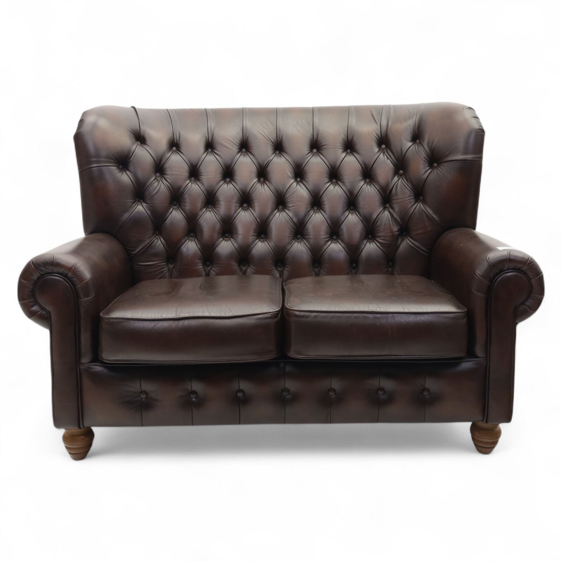 Thomas Lloyd  - two-seater settee, brown leather,  button upholstered back, cushion seats, and wide scrolled arms, raised on bun feet
