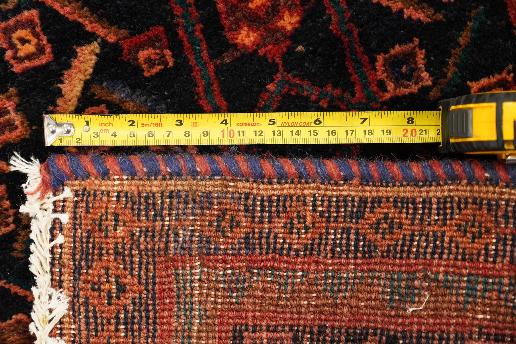 Large Persian indigo ground Herati runner rug, the busy field decorated with repeating geometric and Herati motifs in contrasting tones, enclosed by multiple guard stripes