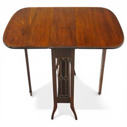 Edwardian mahogany Sutherland table, rectangular drop-leaf top with rounded corners, raised on gate-leg base with pierced end supports