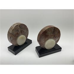 Art Deco style marble and anodised spelter three-piece clock garniture, model with recumbent gazelle, centre piece L52cm.  