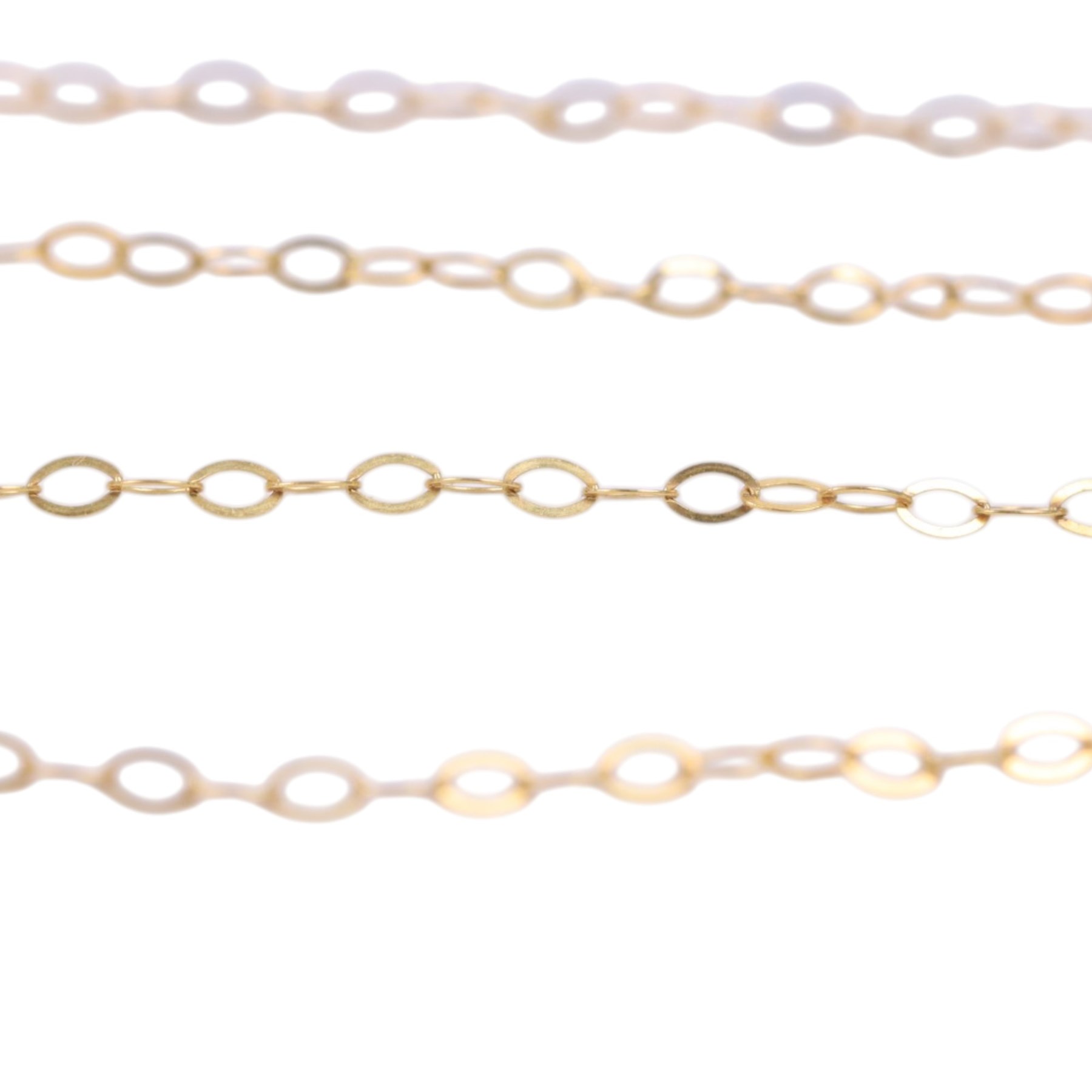 18ct gold charm and two single earrings, 14ct gold single earring and 9ct gold jewellery oddments, comprising single earrings and chain links