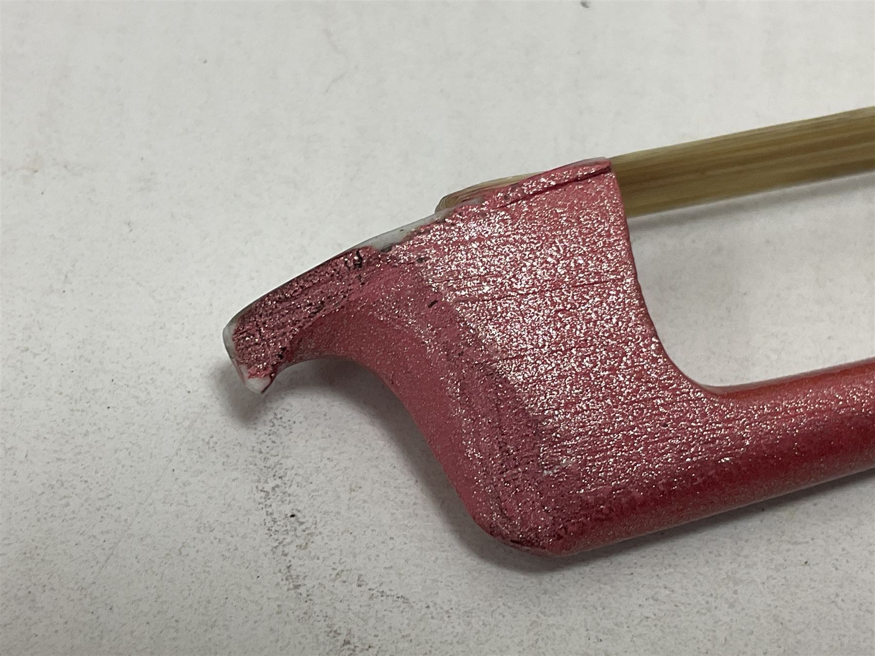 Zest full size pink violin, with a solid wood body and maple head, with matching pink bow and two further bows, in a hard case Length 60cm