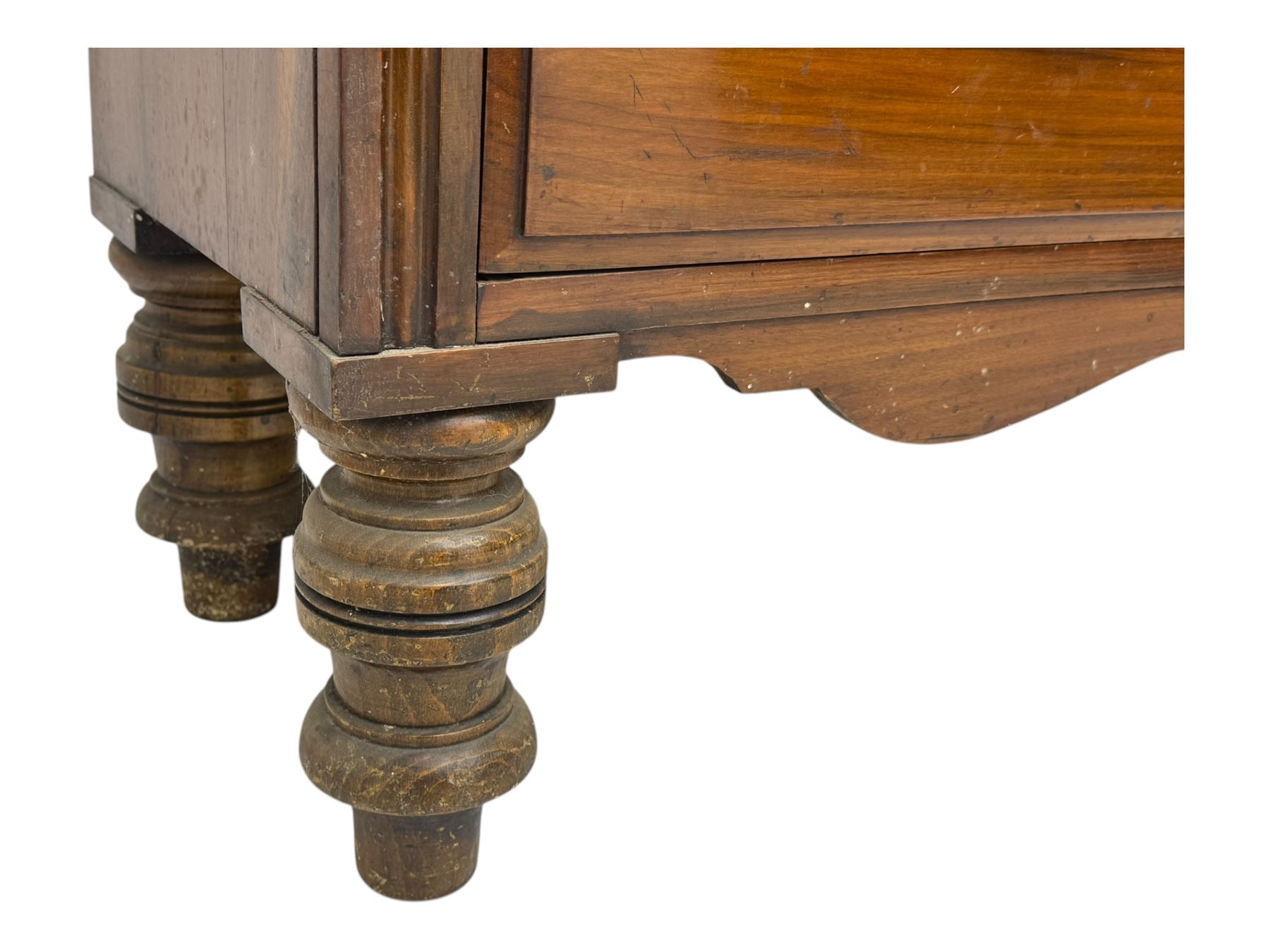 Victorian walnut dresser, projecting cornice over mirrored front, fitted with two short over two long drawers, on turned feet