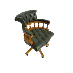 Swivel office desk chair, upholstered in buttoned green leather