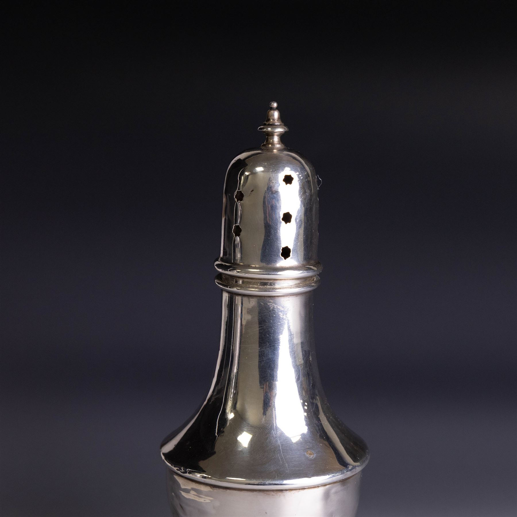 1920s silver sugar caster, of typical form with removable pierced cover and weighted base, hallmarked Marson & Jones, Birmingham 1923, H16cm