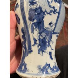 Chinese Kangxi porcelain vase, of baluster form painted in underglaze blue with seated figures and attendants, with fence, rockwork and leafy bamboo branches, with concentric circles mark beneath, H22.5cm