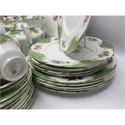 Paragon Rockingham pattern part tea and dinner service including three teapots, milk jug, cups and saucers of various sizes, ten soup bowls, ten side plates, ten dinner plates etc (96)