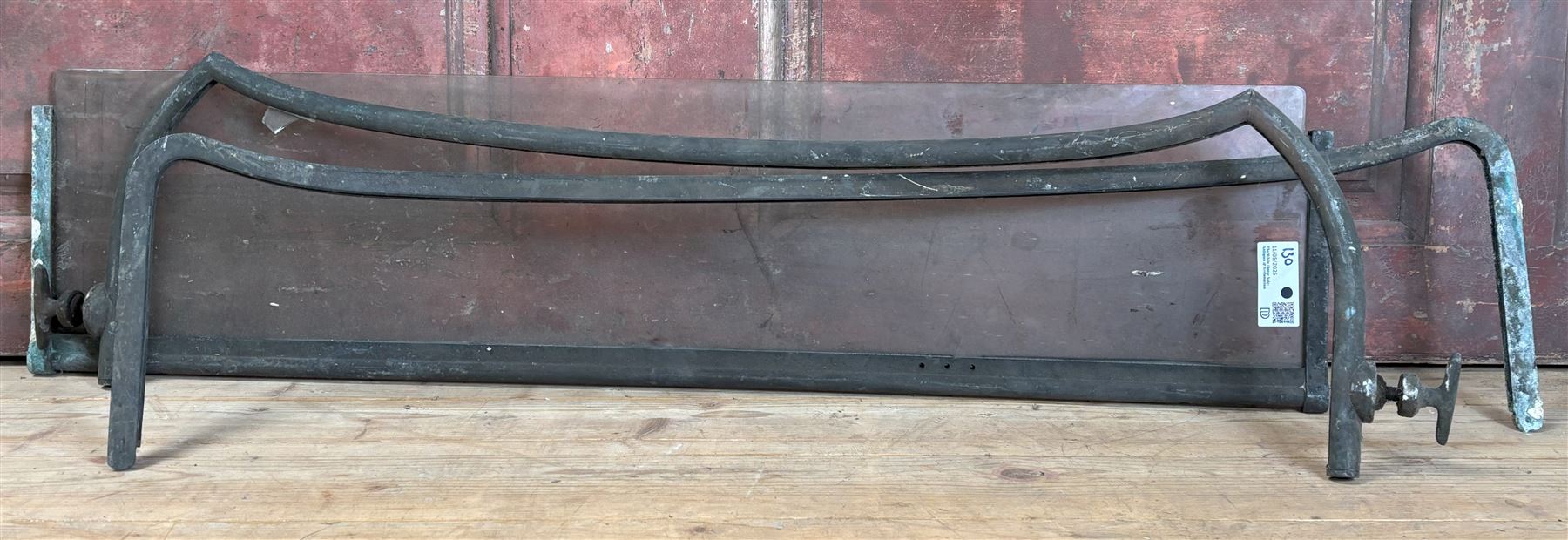 Collection of vintage bicycle spanners, car battery terminals, fittings, radiator caps etc, together with three vintage sportscar windscreen frames - COLLECTION BY APPOINTMENT FROM: The White House, Thirsk Road, Easingwold, York, YO61 3NF - CALL 01723 507111 TO ARRANGE